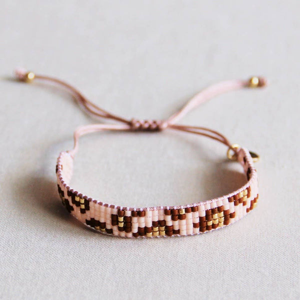 Bracciale in tessuto con stampa leopardata - cognac/pesca