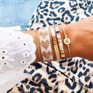 Bracciale in tessuto con cuori | nudo/beige