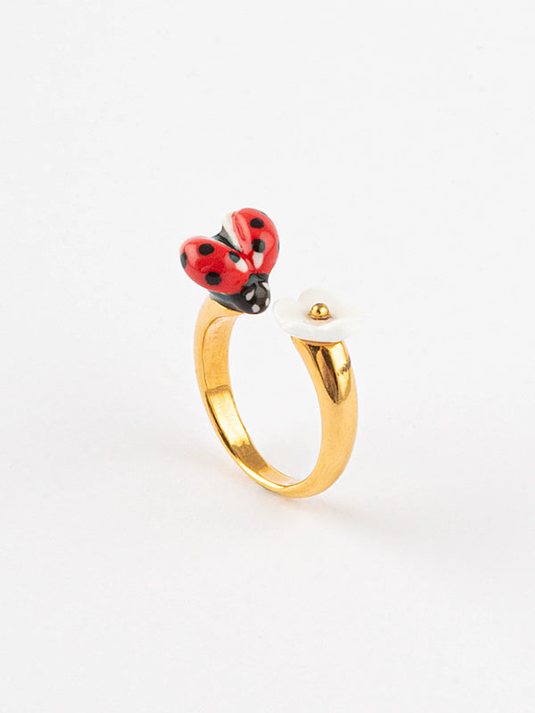 Anello face to face | Coccinella e fiore
