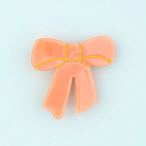 Fermaglio per capelli con fiocco rosa