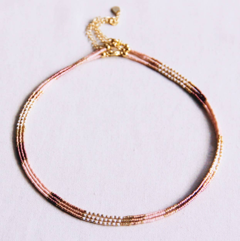 Collana con perline nude/bianco/tortora